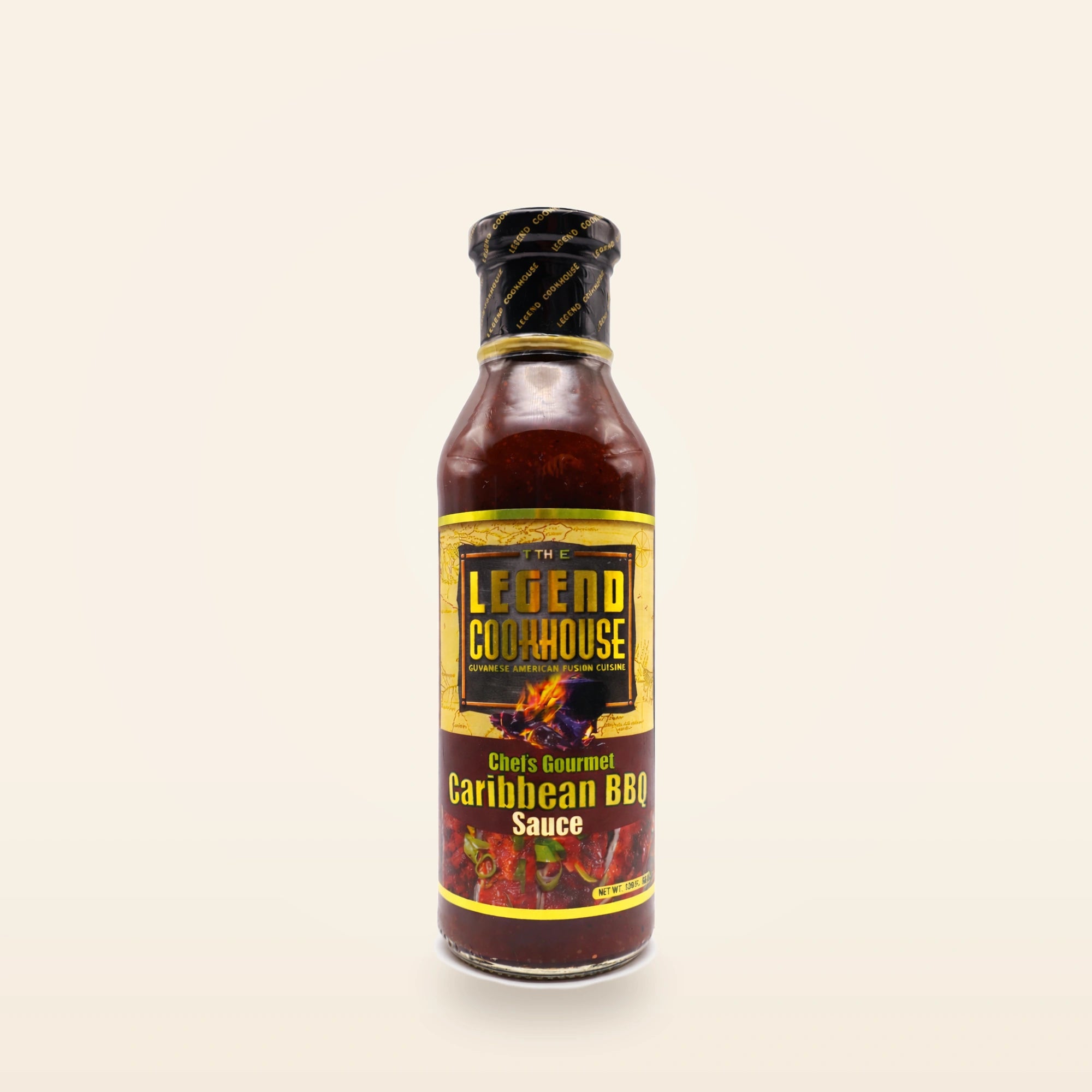 Legend Caribbean BBQ bottle on a clean cream background with subtle grill and glaze accents