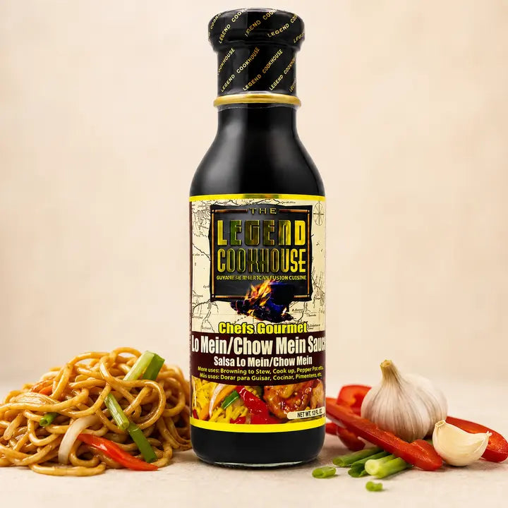 Legend Chow Mein and Lo Mein Sauce bottle with noodles, garlic, peppers, scallions, and warm cream background