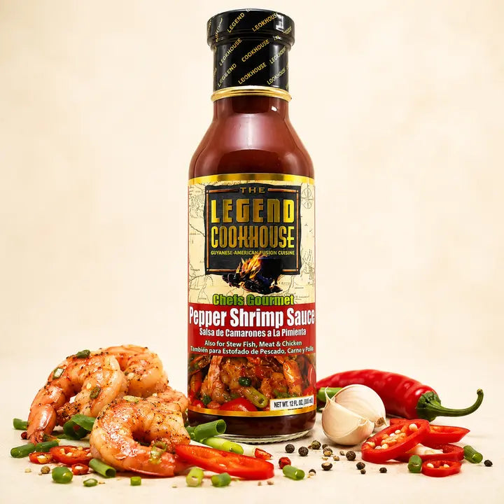 Legend Pepper Shrimp Sauce bottle with shrimp, peppers, garlic, scallions, and warm cream background